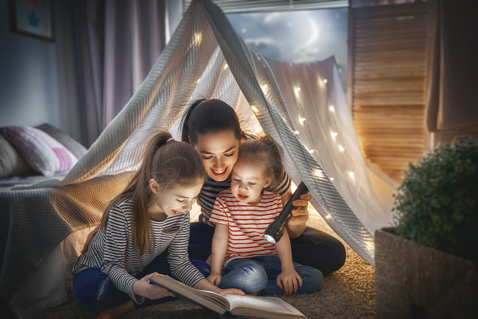 Mom and Children Reading Book